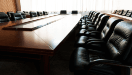 Conference table and chairs in modern meeting room